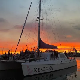 a boat is docked next to a body of water