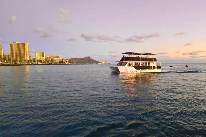 a close up of a boat next to a body of water