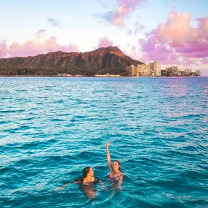 a person swimming in a body of water