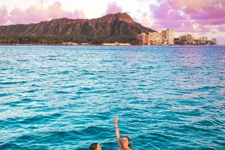 a person swimming in a body of water