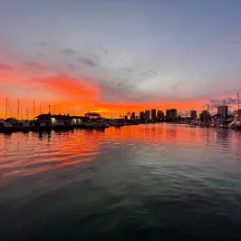 a sunset over a body of water
