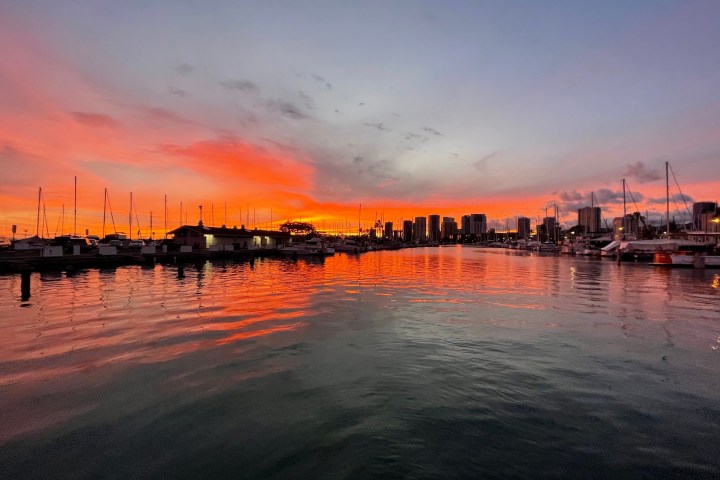 a sunset over a body of water