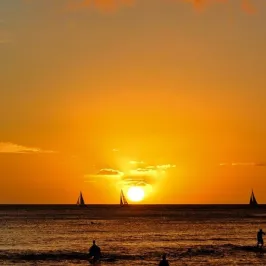 a sunset over a beach