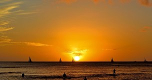 a sunset over a beach