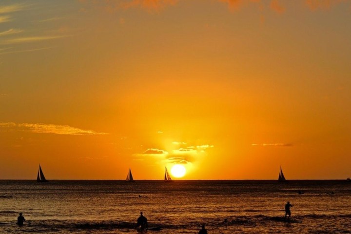 a sunset over a beach