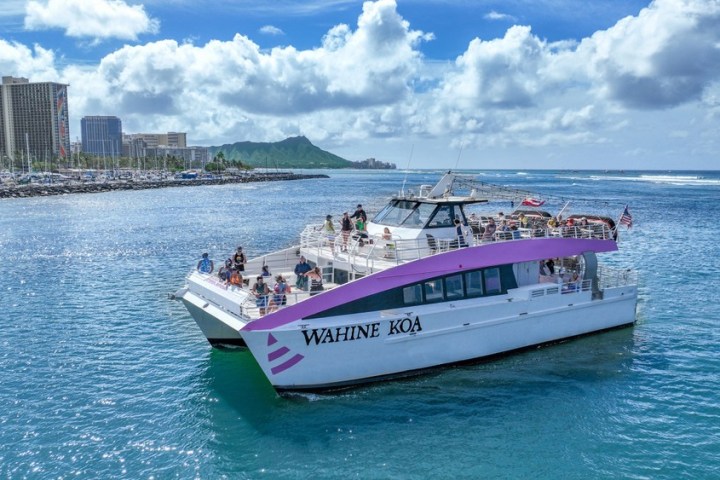 a small boat in a large body of water